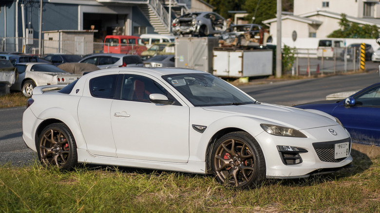 Mazda Rx8 with rotary engine is cruising in Japan countryside.