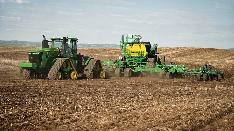 A John Deere 9RX 640 on a farm