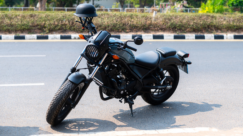 fuel pump filling up motorcycle with petrol