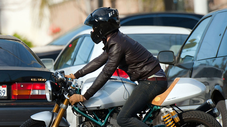 Ryan Reynolds on a motorcycle