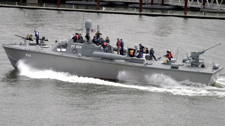 A Higgins Patrol Torpedo Boat (PT-658) in operation on the water