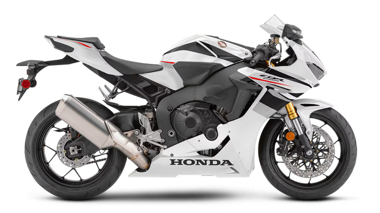 Side view of a white Honda CBR1000RR on a white background