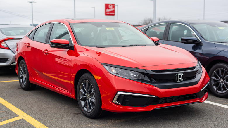 A red 2021 Honda Civic parked