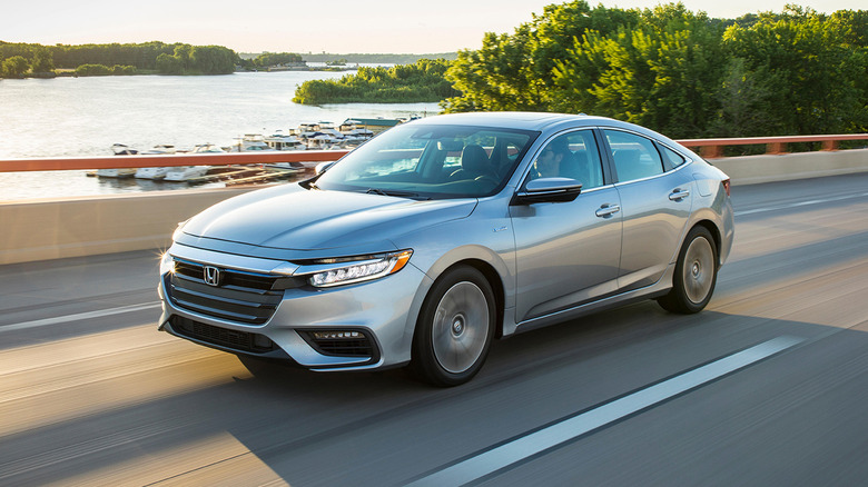 A silver 2021 Honda Insight driving