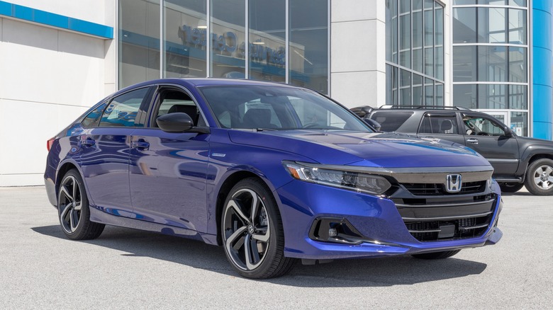 A blue 2022 Honda Accord parked at a dealership