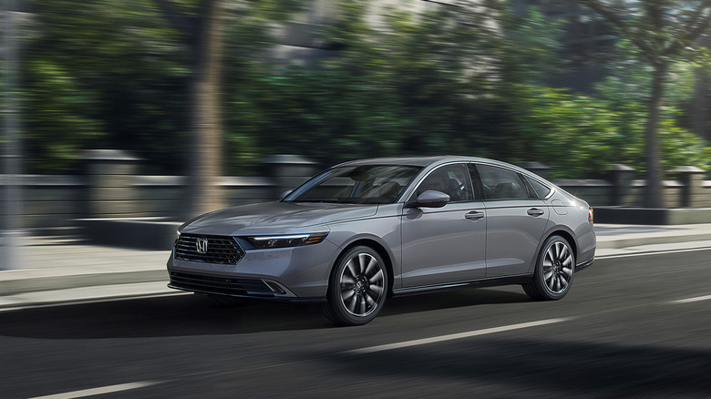 A gray 2023 Honda Accord driving