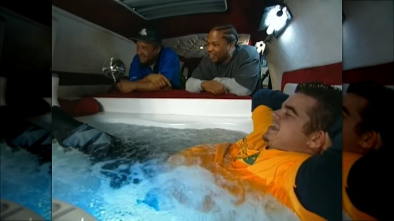 Man lying in hot tub