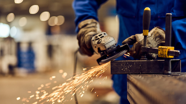 using an angle grinder in workshop