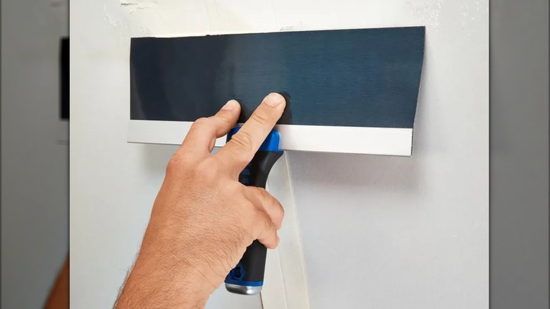 using a taping knife