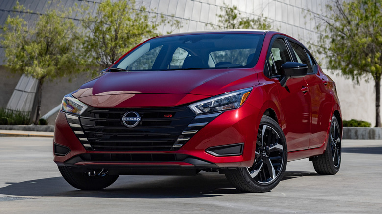 Nissan Versa near buildings