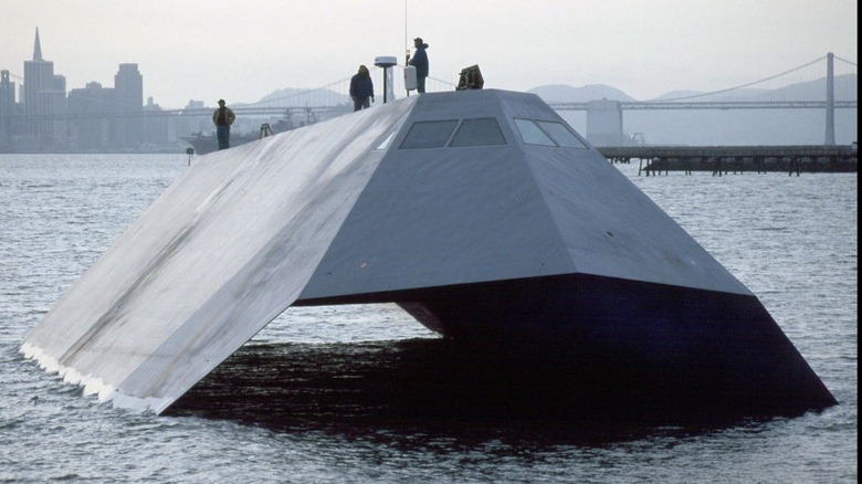 Personnel standing atop the Sea Shadow