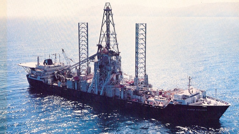 The USNS Glomar Explorer anchored near a coastline