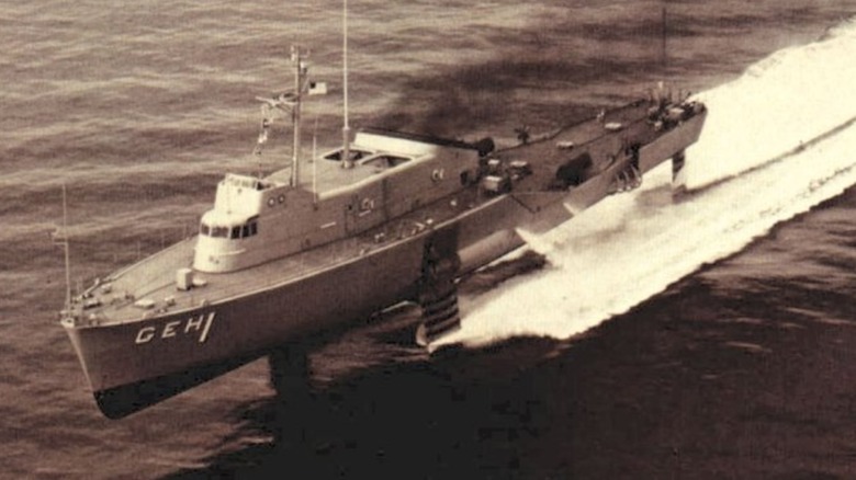 The USS Plainview underway at sea atop its hydrofoils