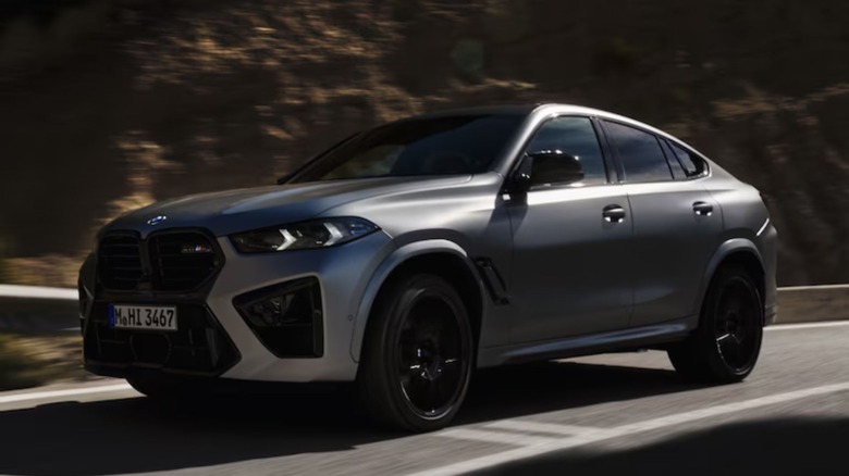 2026 BMW X6 M driving on road