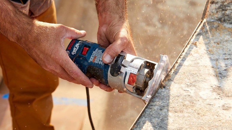 man using Bosch power tool