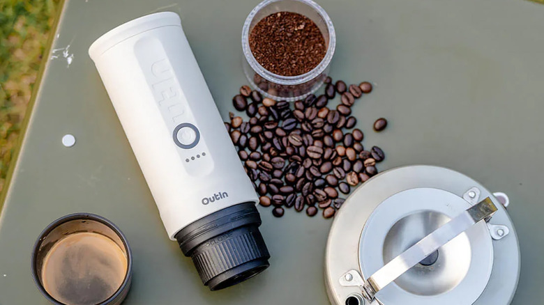 An OutIn Nano Espresso Machine being displayed
