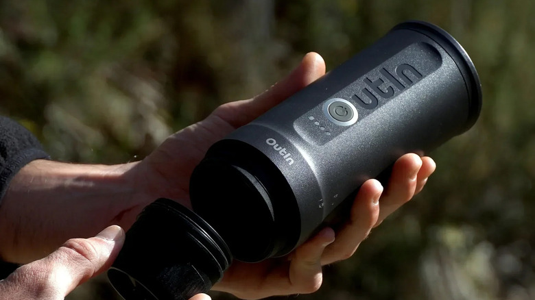 An OutIn Nano Espresso Machine being displayed