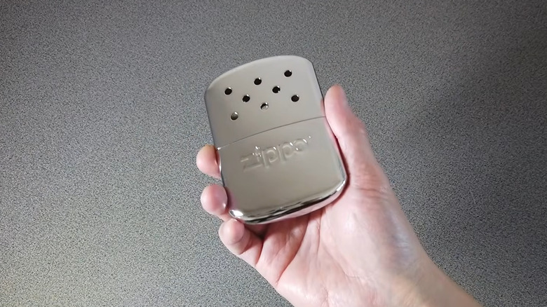 A Zippo Refillable Hand Warmer on display
