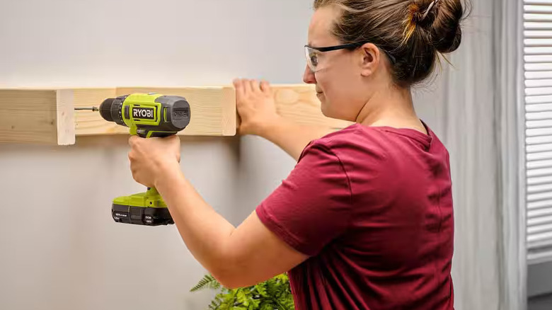 DIYer uses a Ryobi 1/2 inch drill