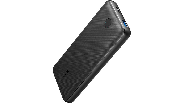 A black Anker portable phone charger