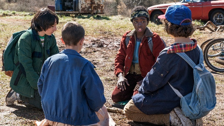 Stranger Things kids in a circle
