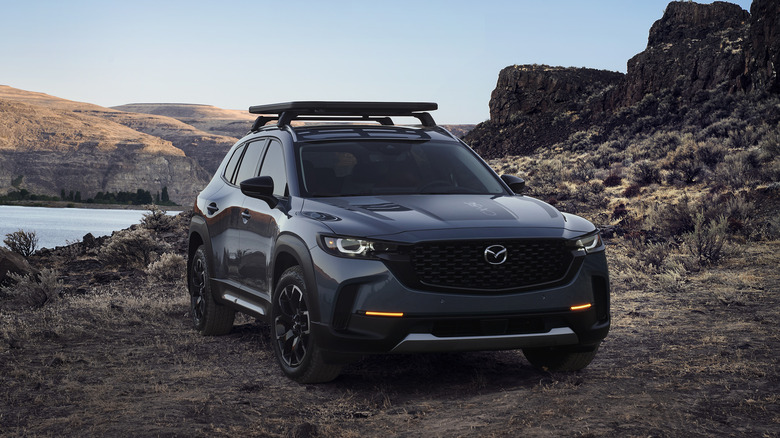 2025 Mazda CX-50 Turbo in the wild front 3/4 view