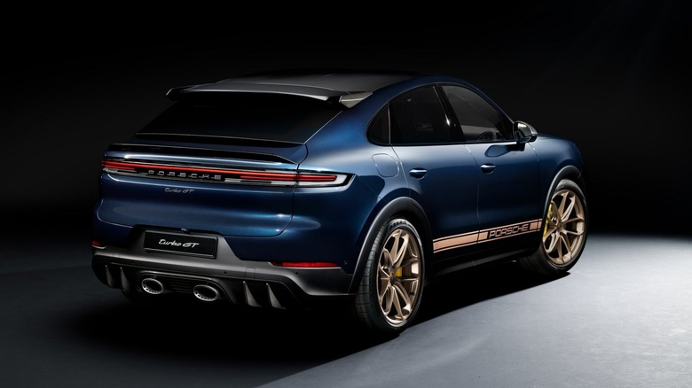 Porsche Cayenne Coupe Turbo GT rear 3/4 on black background