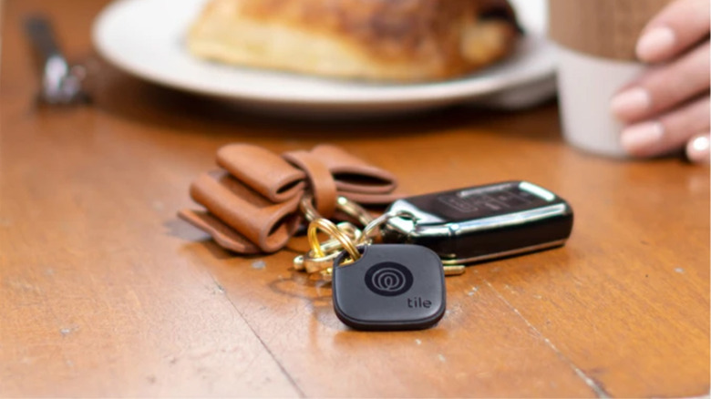 A Tile Mate on a keychain on a table