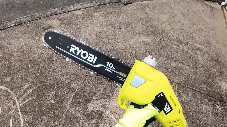 A close up of a Ryobi Cordless Pole Saw