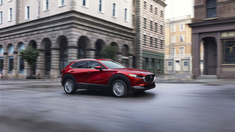 Mazda CX-30 driving through the city