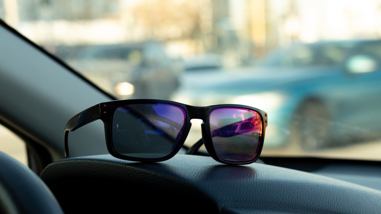 a pair of sunglasses on the dashboard