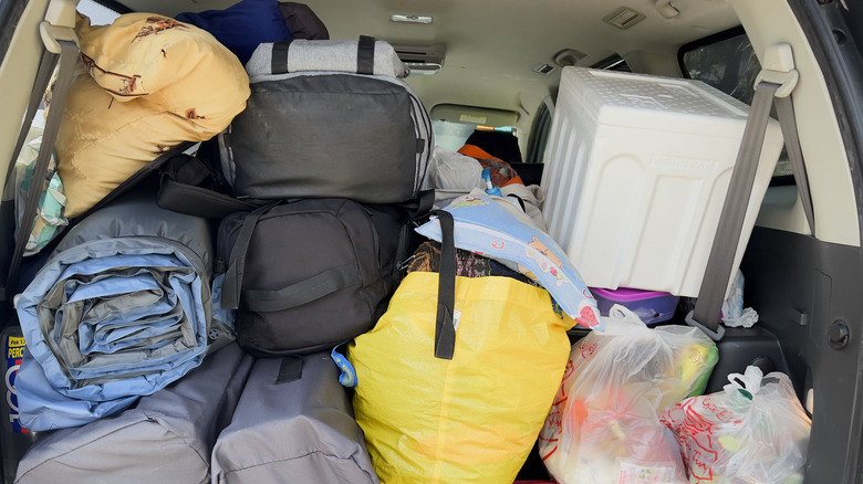A car trunk full of items