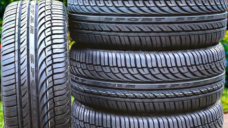Stack of four Fullway tires