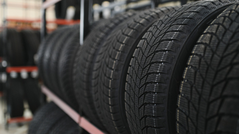 A row of tires in tire shop.