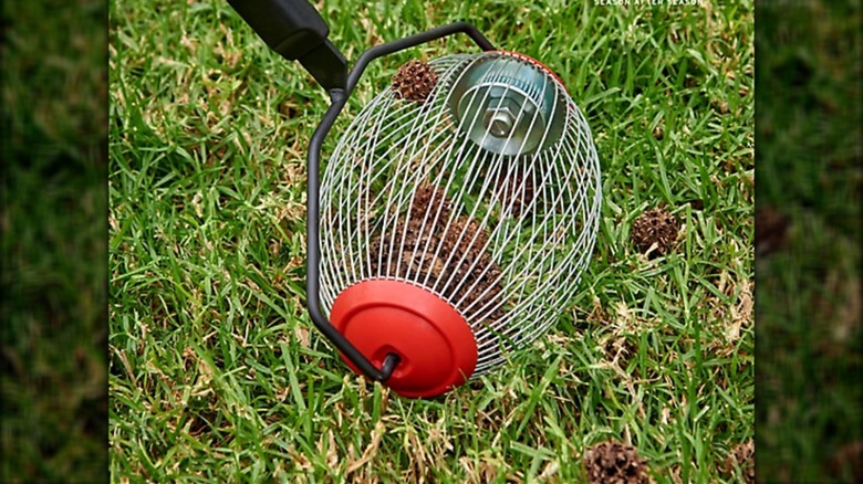 picking up yard debris with clearing tool