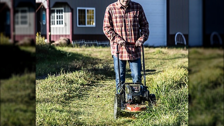 mowing lawn with Earthquake string mower