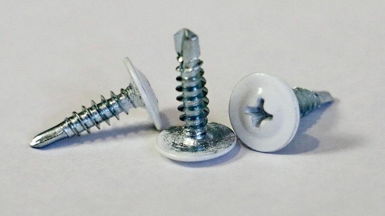 Three flange head screws