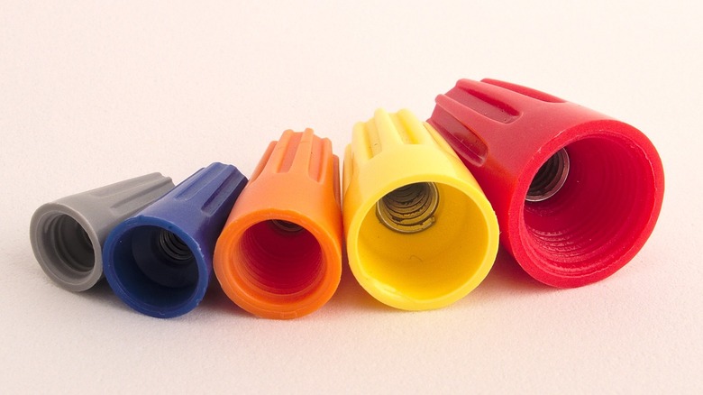 A collection of wire connectors in various colors