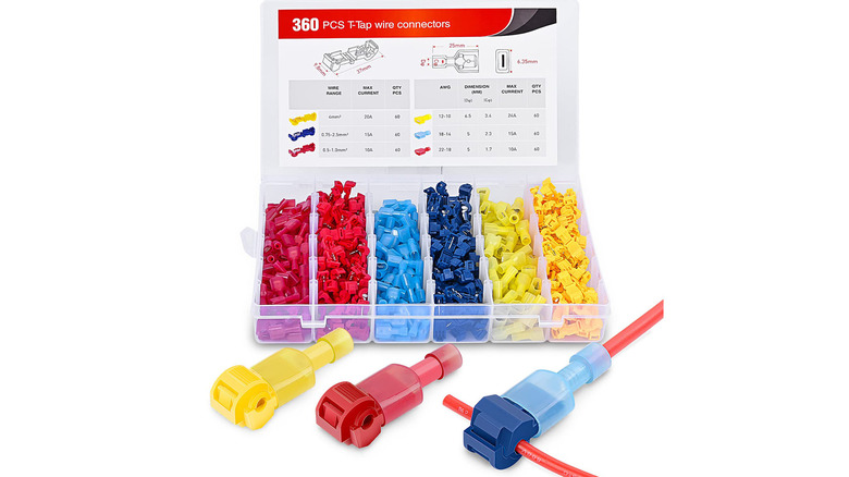 A container filled with t-tap wire connectors in varying colors