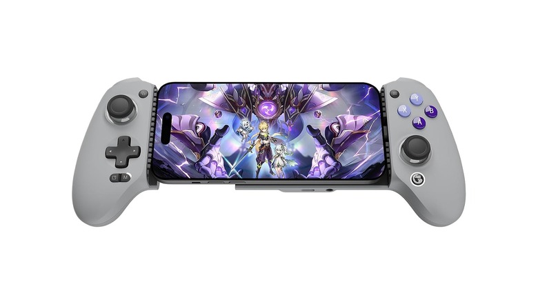 Smartphone mounted onto a handheld gaming controller.