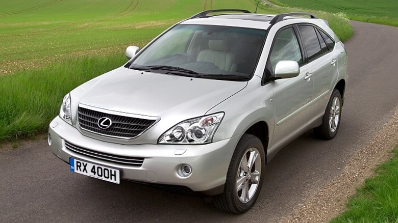 Silver 2006 Lexus RX 400h parked on a rural road.