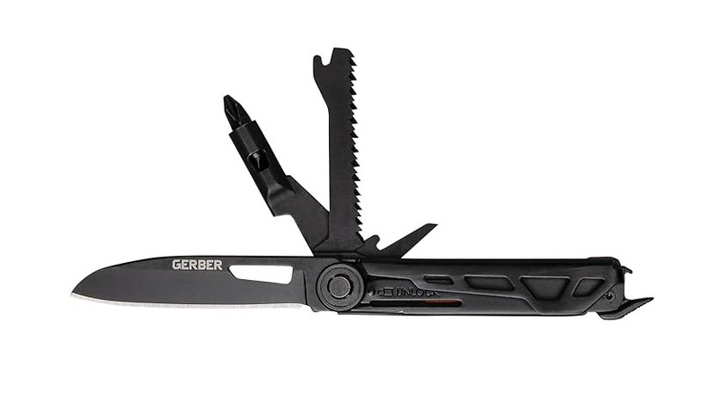 Gerber multi-tool with knife and tools spread on a white background
