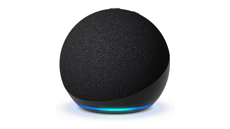 Round black speaker with blue light on the bottom