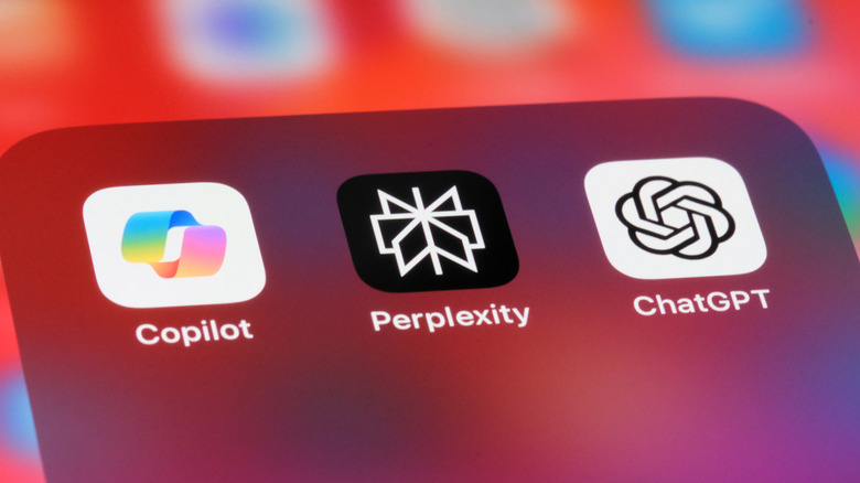 Copilot, Perplexity AI, and ChatGPT icons on a smartphone
