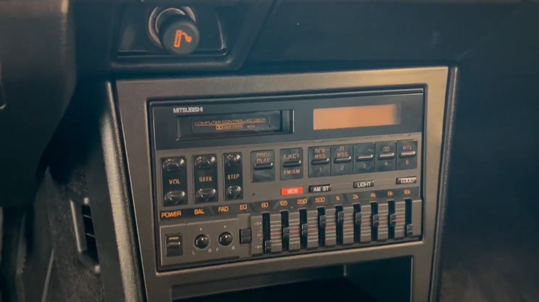 A stock cassette deck and graphic equalizer in a 1987 Chrysler Conquest TSi