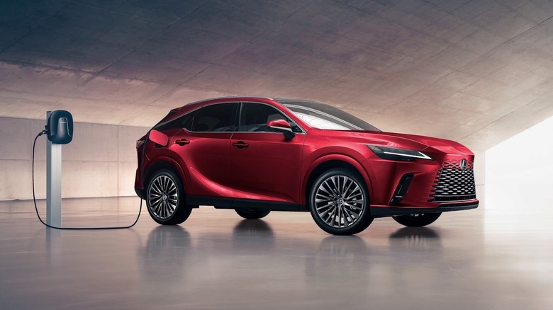 Lexus RX Hybrid plugged into a charger