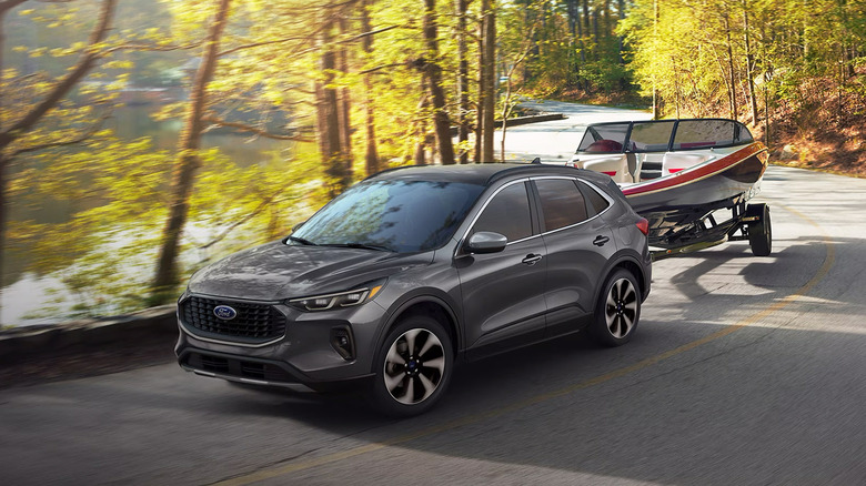 A gray Ford Escape driving
