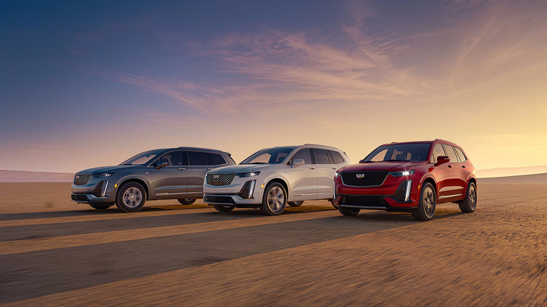 Three Cadillac XT6s driving