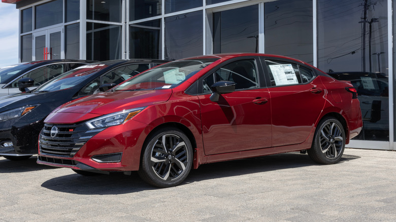 2025 Nissan Versa on display in red