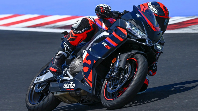 Aprilia RS 457 being ridden on a racetrack